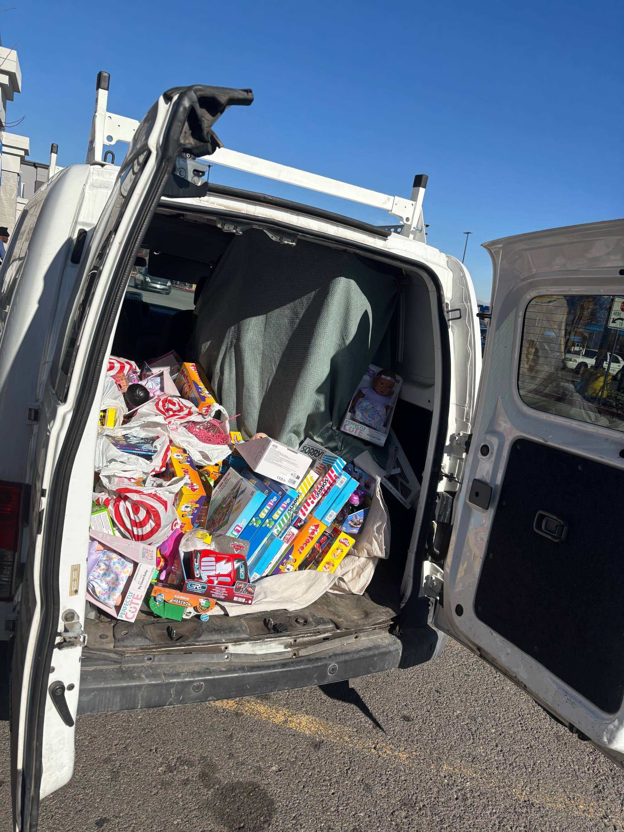 Open van full of toys for donation