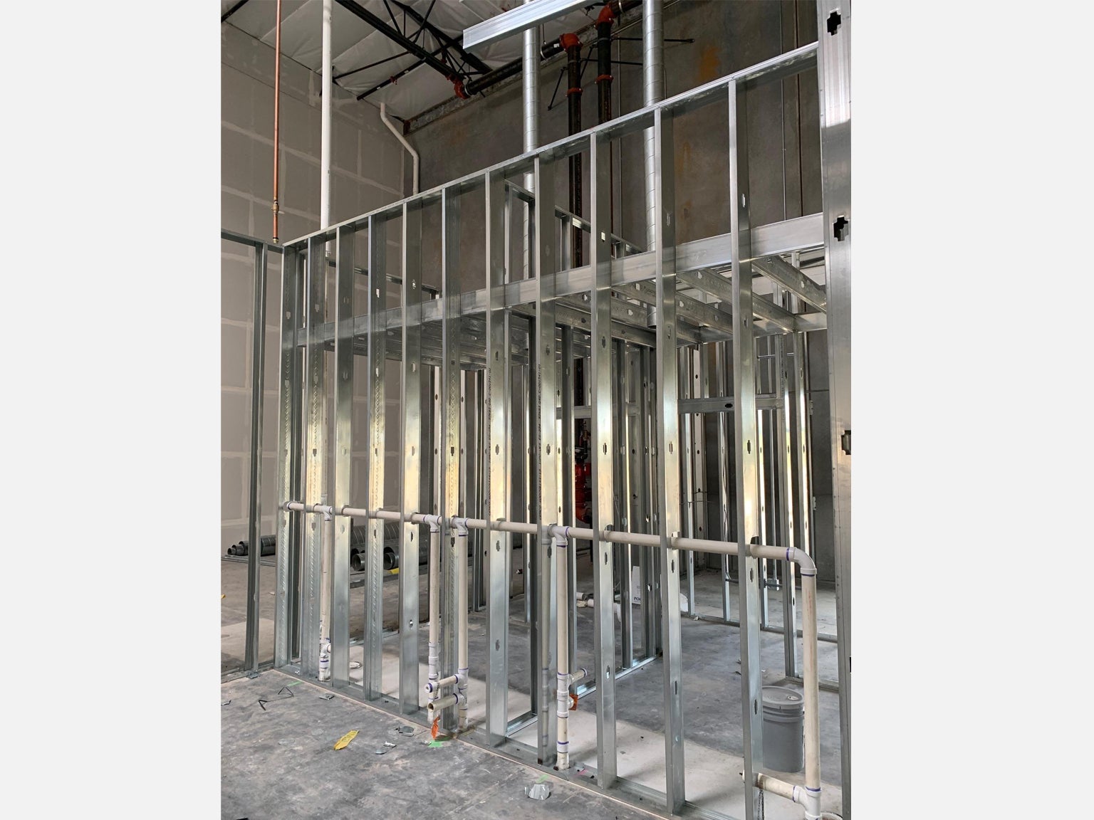 Plumbing in metal stud wall
