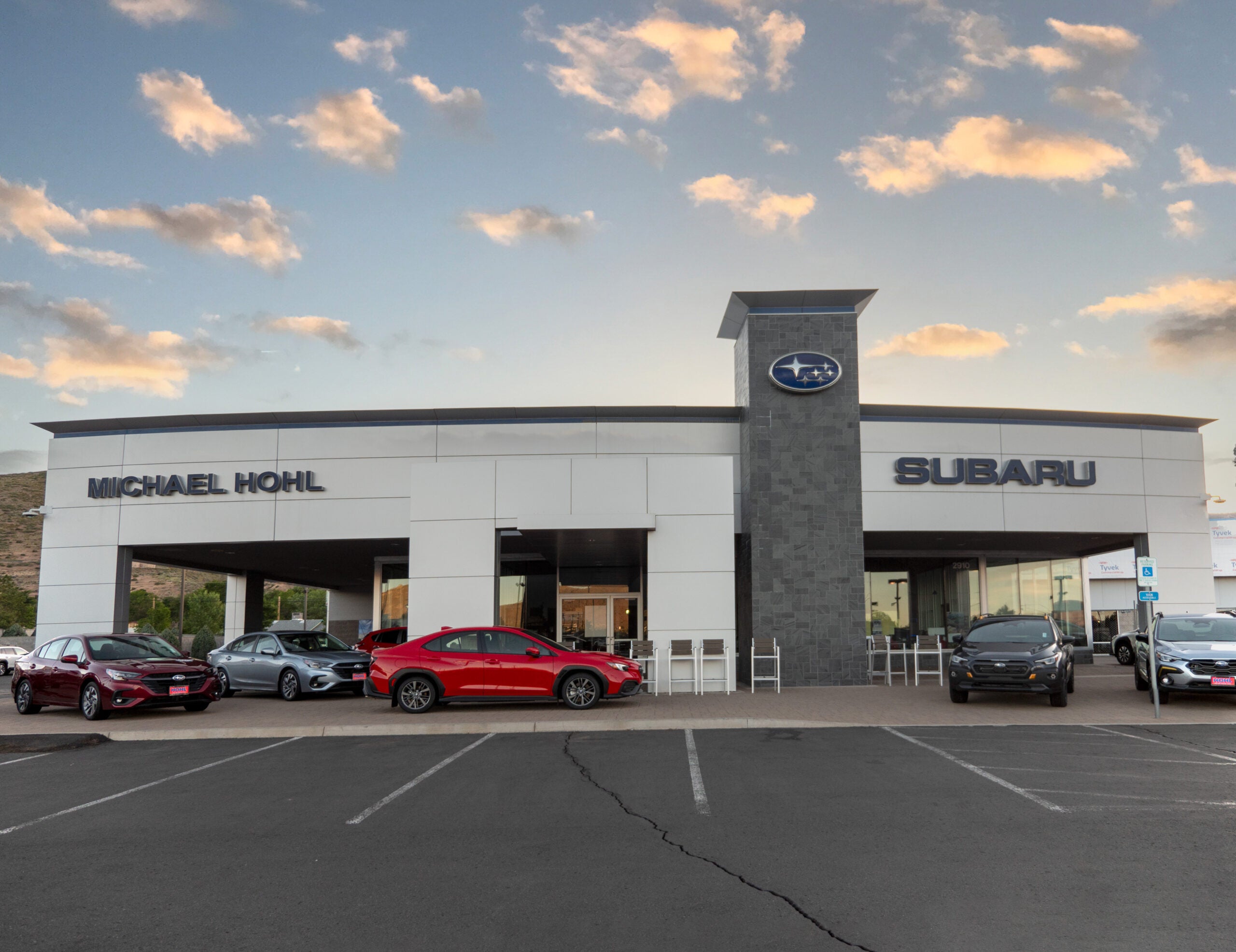 Subaru car dealership facade with sign
