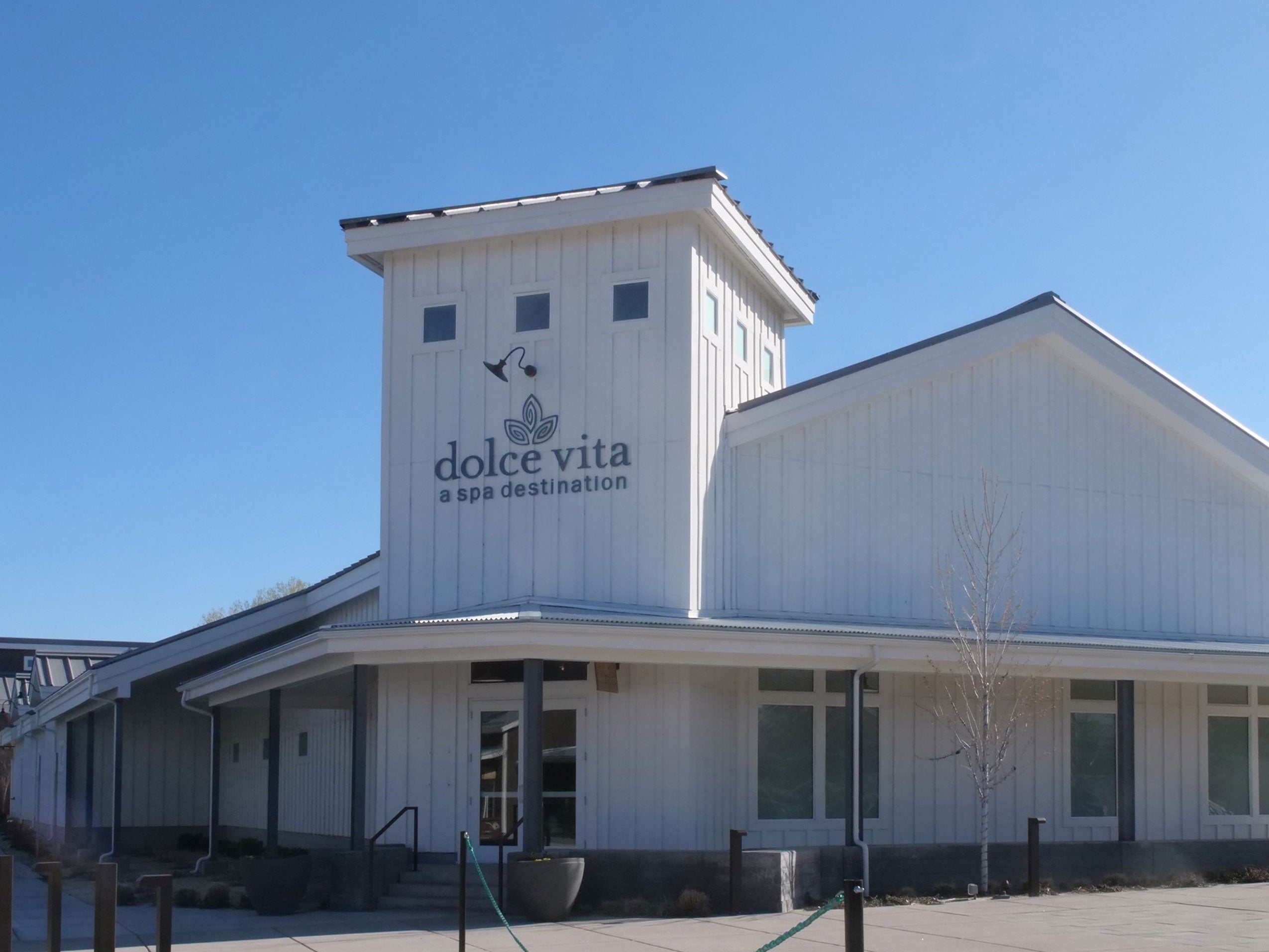 White, multi-story commercial building (Dolce Vita)